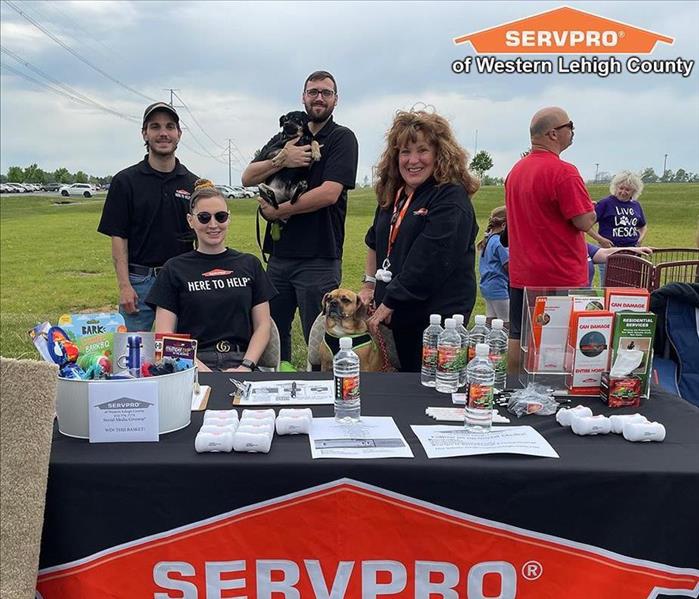 SERVPRO employees at our table at a local event we sponsored.